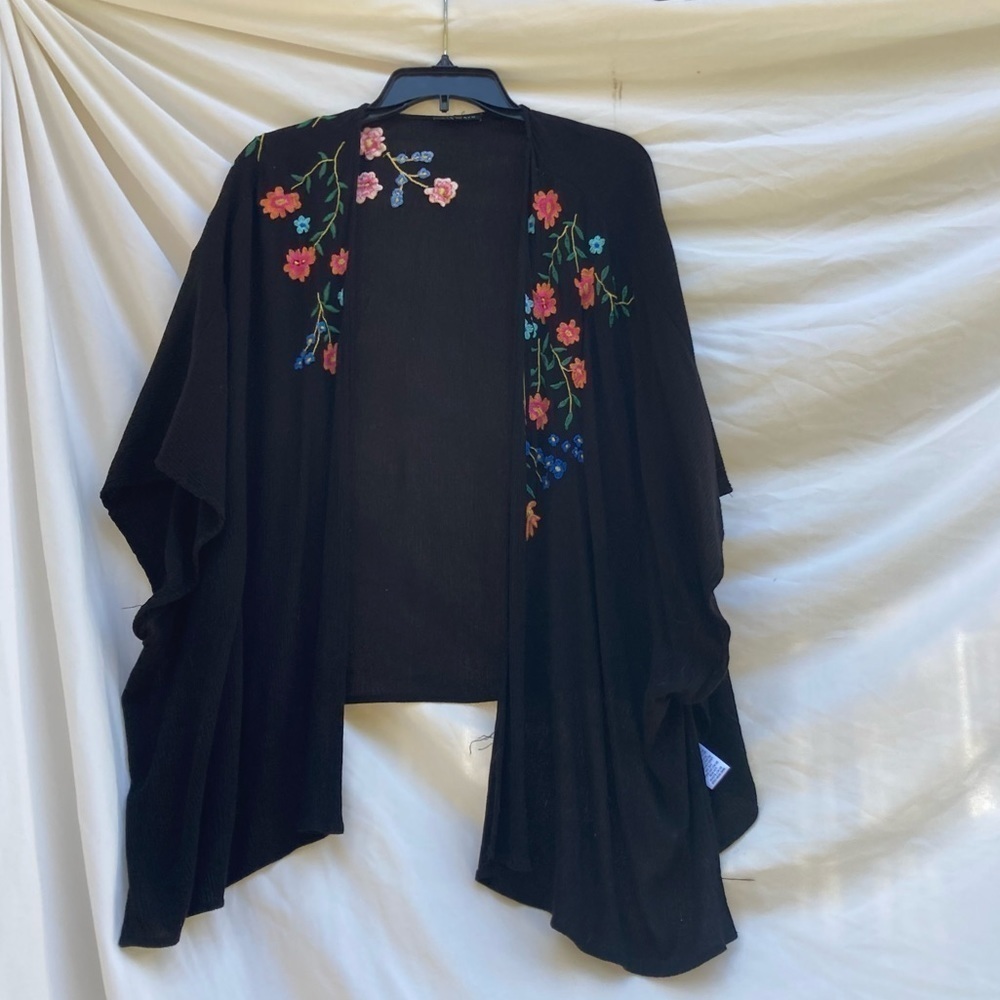 Staccato black shawl with embroidered flowers and arm holes, size small